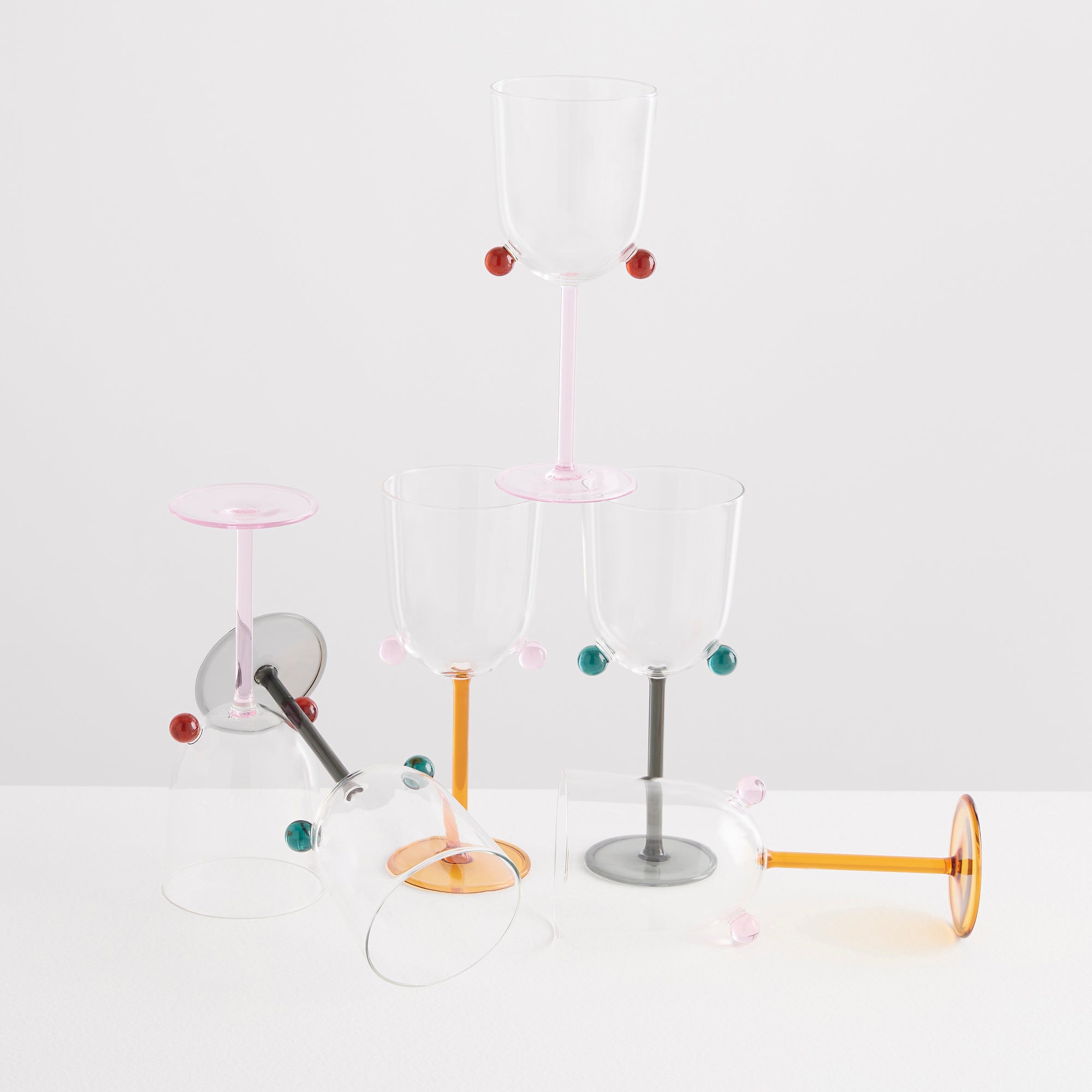 https://www.maisonbalzac.com/cdn/shop/files/Maison_Balzac_2_PomPom_Wine_Glasses_group_822ede4e-a383-463b-b0c2-35333340b82e_2000x.jpg?v=1681966655