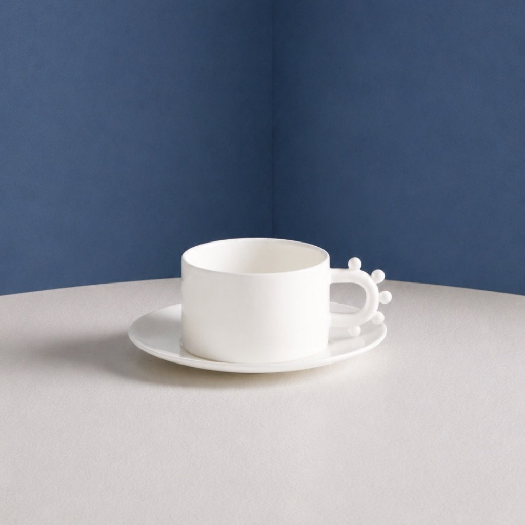 Pomponette Teacup & Saucer